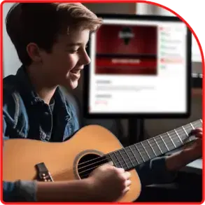 A young student playing an electric guitar